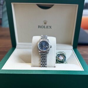 Rolex Women's Silver Watch with Blue Dial